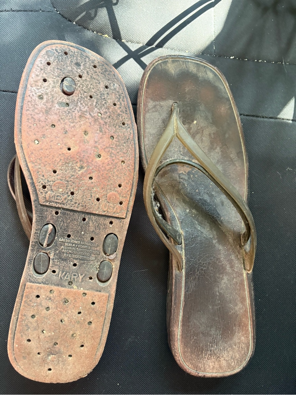 Well worn Brown Rubber Flip Flop Sandals